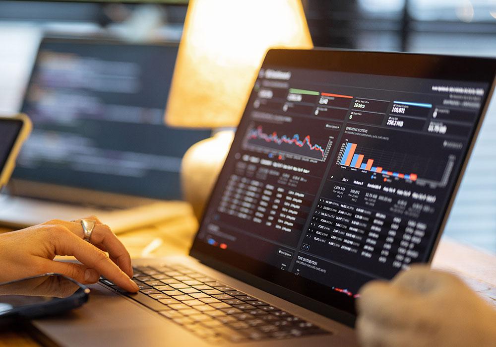 Photograph of a laptop showing ecommerce analytics.