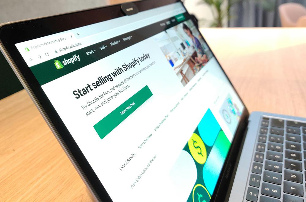 Photograph of a laptop showing performance marketing analytics.