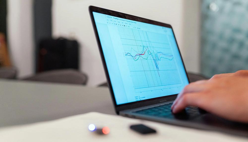 Photograph of a laptop showing ecommerce analytics.